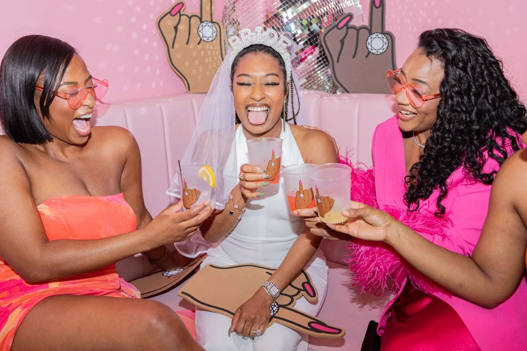 Bride and besties toasting with Brown Skin Bride party cups